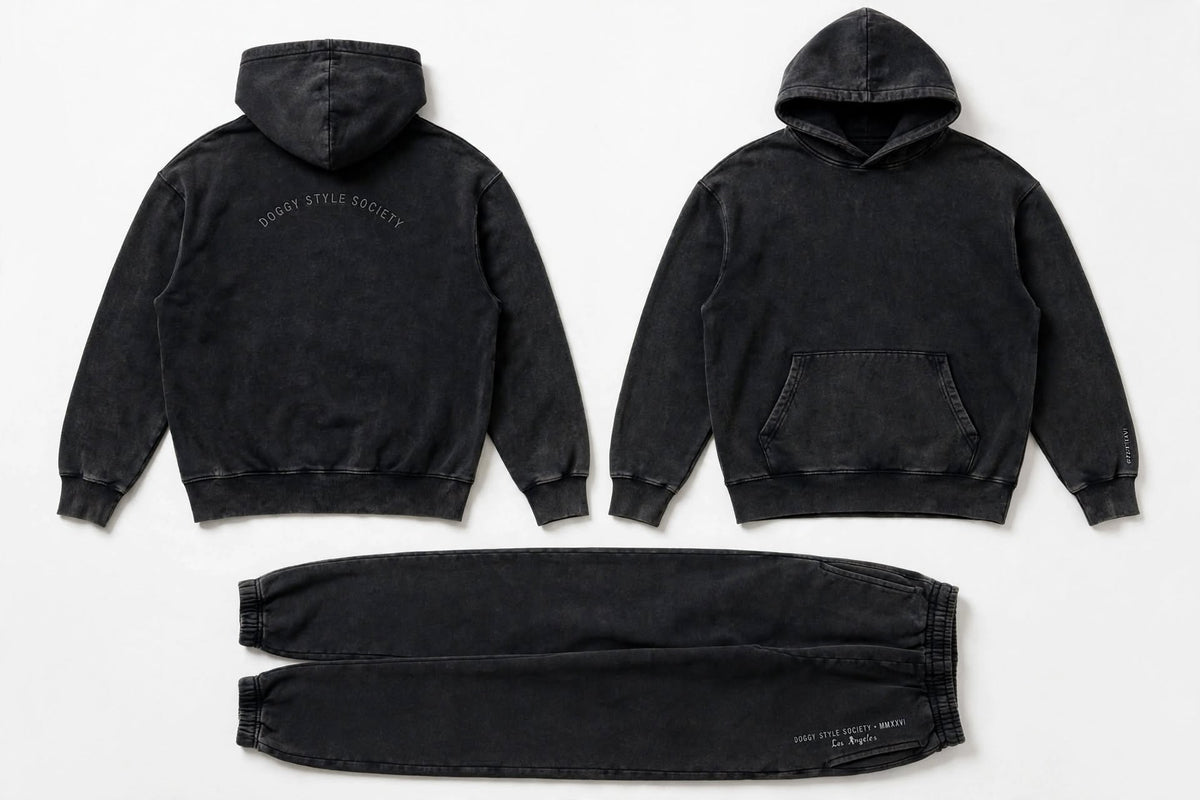 A three-piece matching hoodie and jogger set in a washed black or charcoal color, shown from both front and back views along with the pants. The brand name 'Dusty Style Society' is printed on the back of the hoodies and the left leg of the joggers.